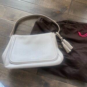 Kate spade stone color tassel bag